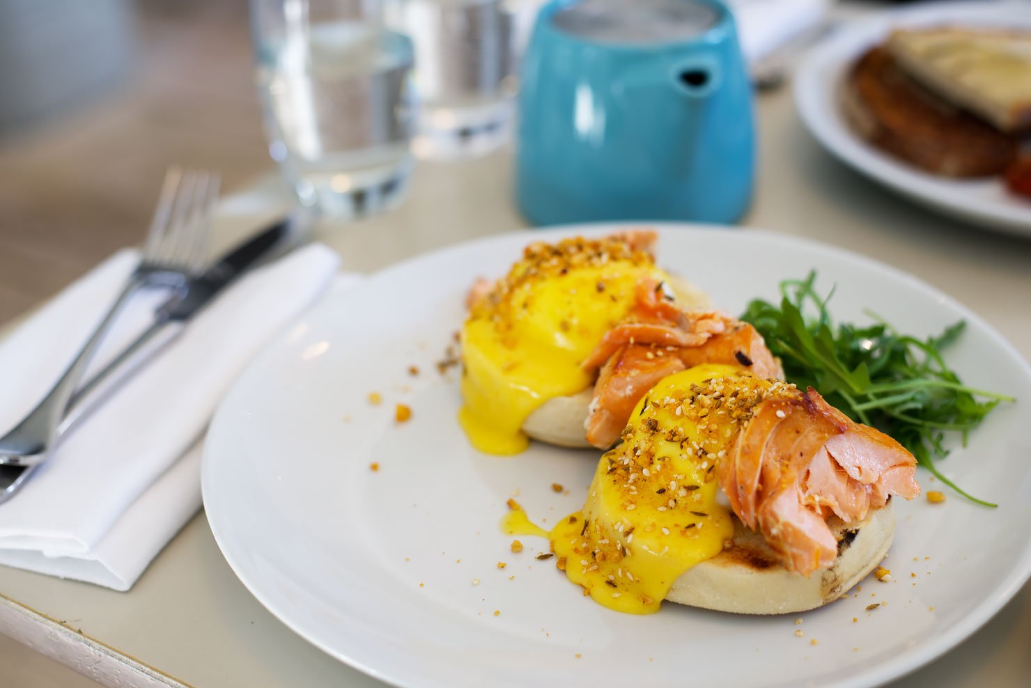 Brunch at The Modern Pantry in Clerkenwell, London. Poached eggs with tea-smoked salmon.
