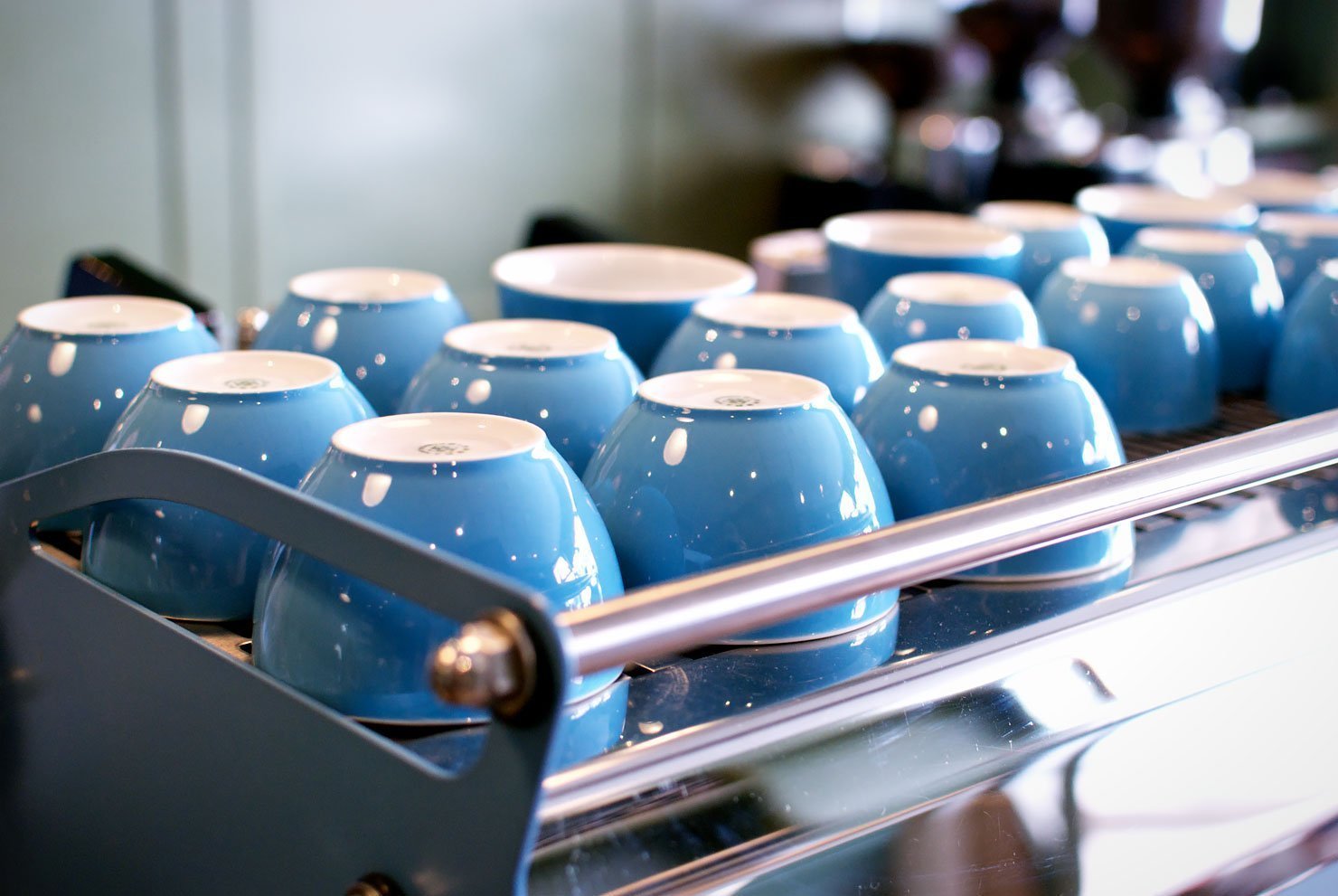 The blue coffee cups at Workshop Coffee & Co. in Marylebone, London - One of London's best coffee places.