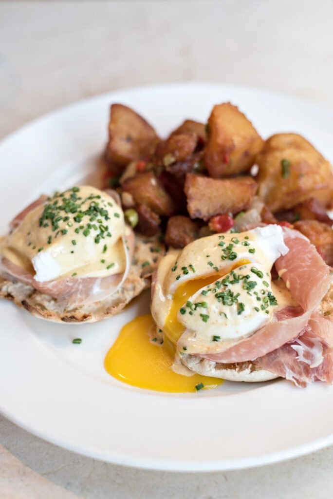 Trendy boutique hotel The Ludlow in New York City / Brunch at restaurant Dirty French