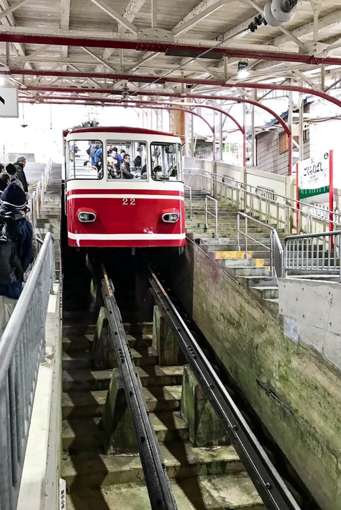 Koyasan | Sleeping in a Japanese Buddhist temple: a unique stay you'll never forget. Koyasan Cable Car.