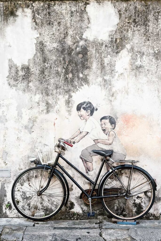 Photos that will make you want to visit Malaysia's Food Capital, George Town in Penang, Malaysia | Children on bicycle 