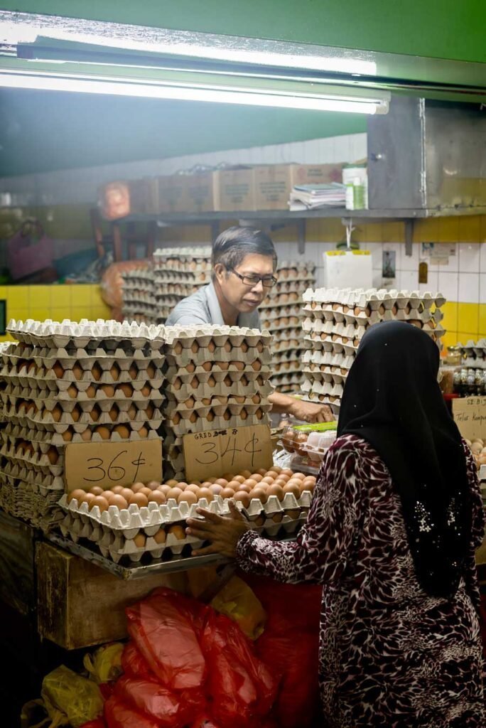 How to spend 3 amazing days in Kuala Lumpur, Malaysia - Visit TTDI Wet Market, Man selling eggs