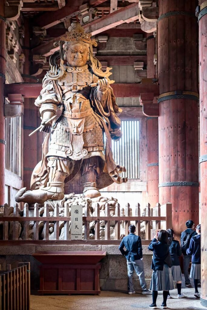 Wooden warrior statues or guardians of the Great Buddha in the Daibutsu-den Hall in Nara. Nara is a great day trip from Kyoto or Osaka