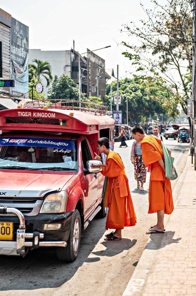 Buddhist monks catching a songthaew in Chiang Mai Old City