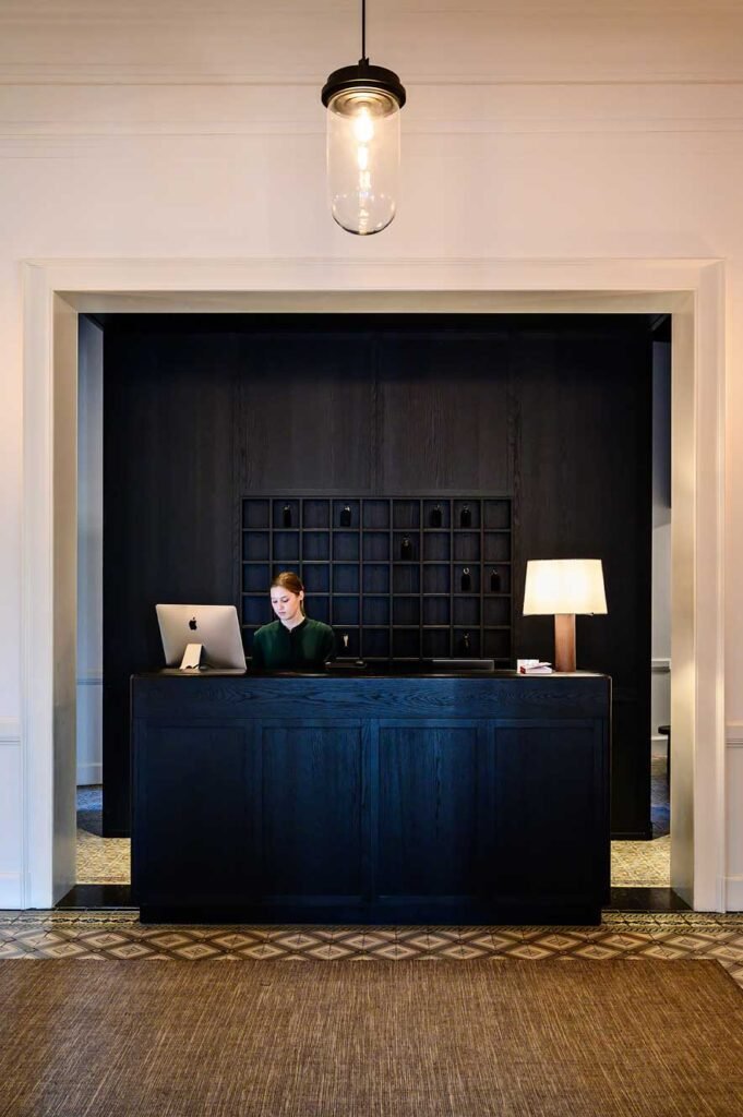 The reception desk at boutique hotel August in Antwerp, Belgium