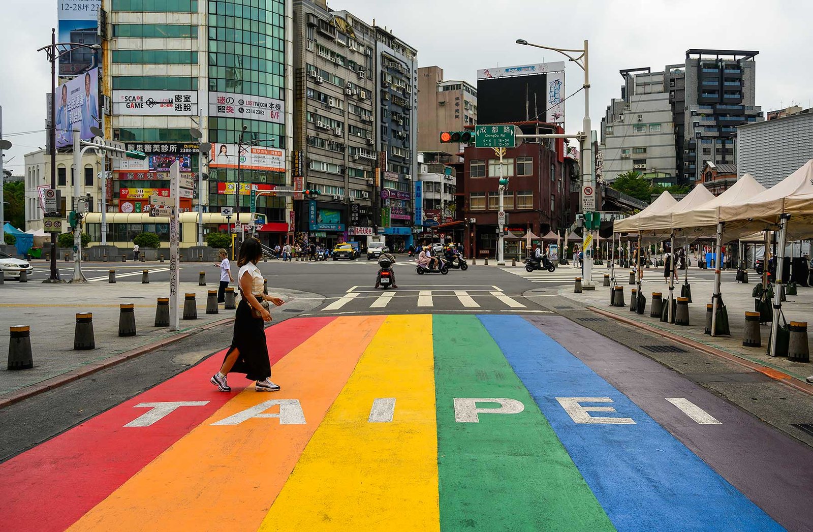 Rainbow road crossing in Ximending with letters Taipei
