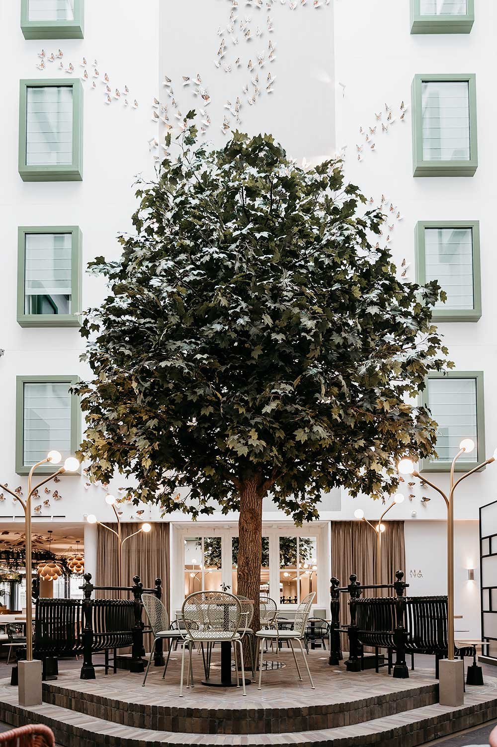 Tree in the lobby of Voco The Hague hotel in the Netherlands