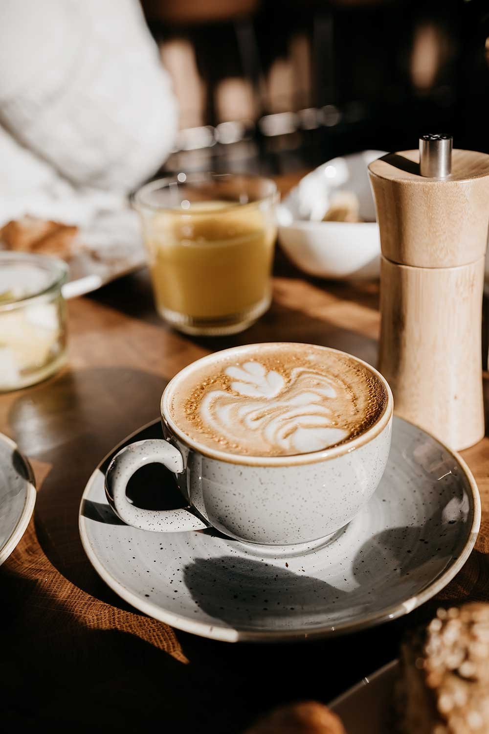 Breakfast with cappuccino at Voco The Hague, a great hotel in the Netherlands