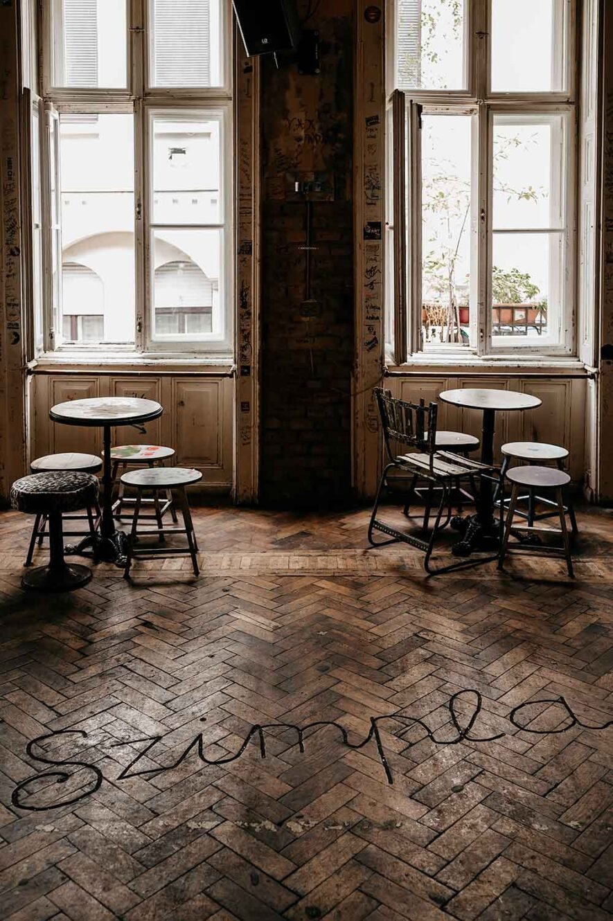Wooden floor with the name Szimpla at ruin bar Szimpla Kert in Budapest