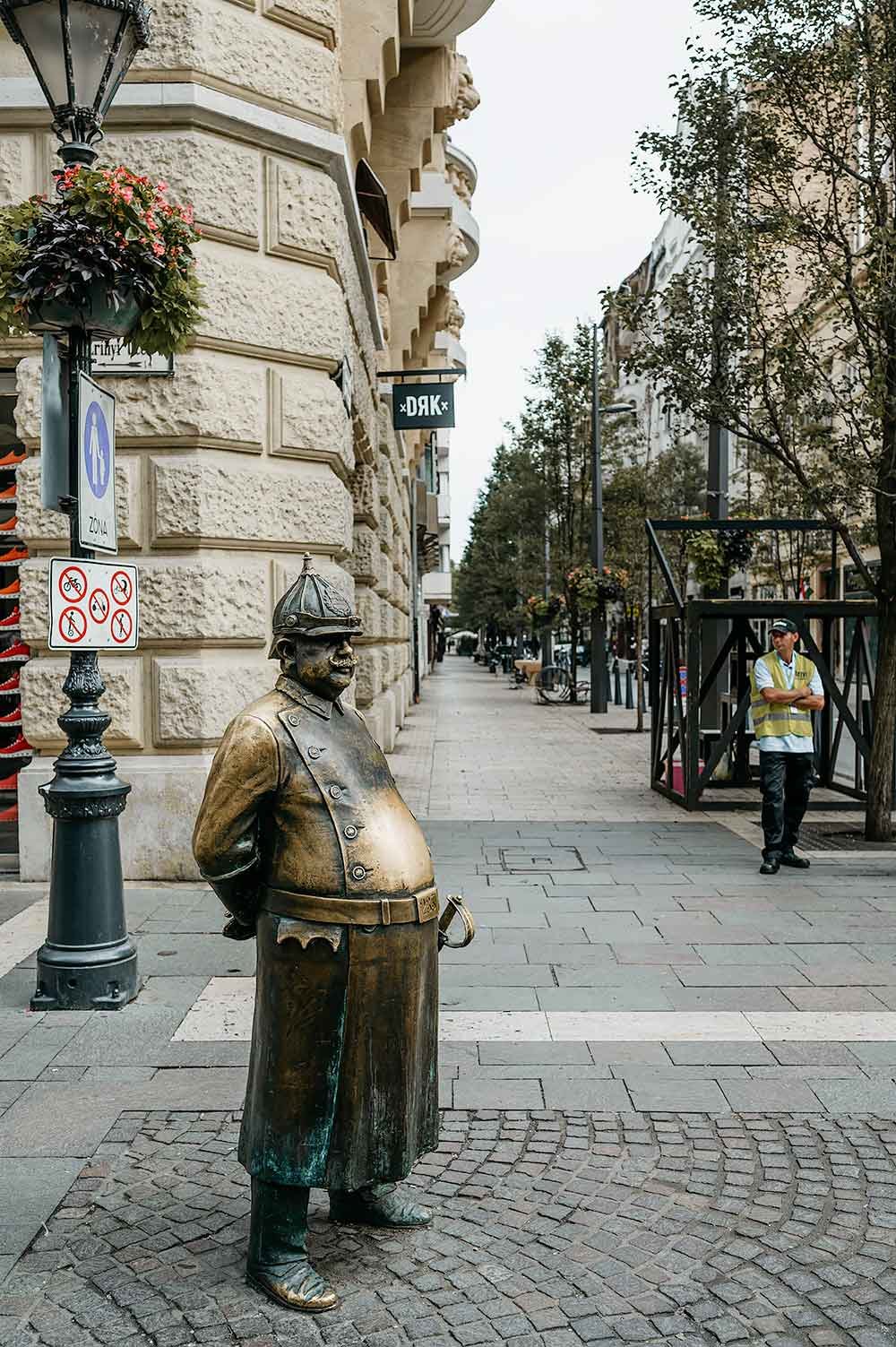 Statue of old police man in Budapest