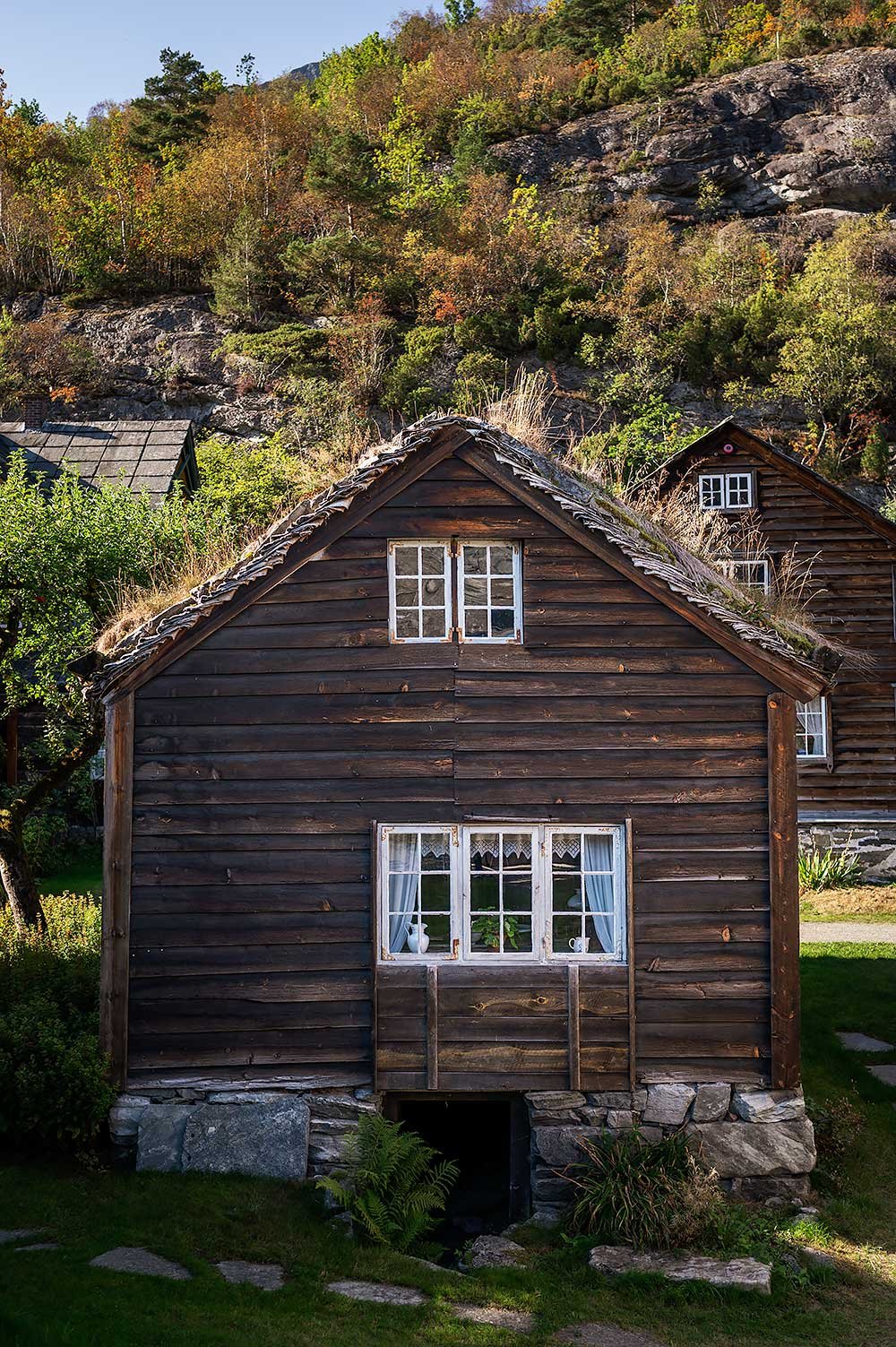 Traditional Norwegian village Agatunet on a road trip to Hardangerfjord
